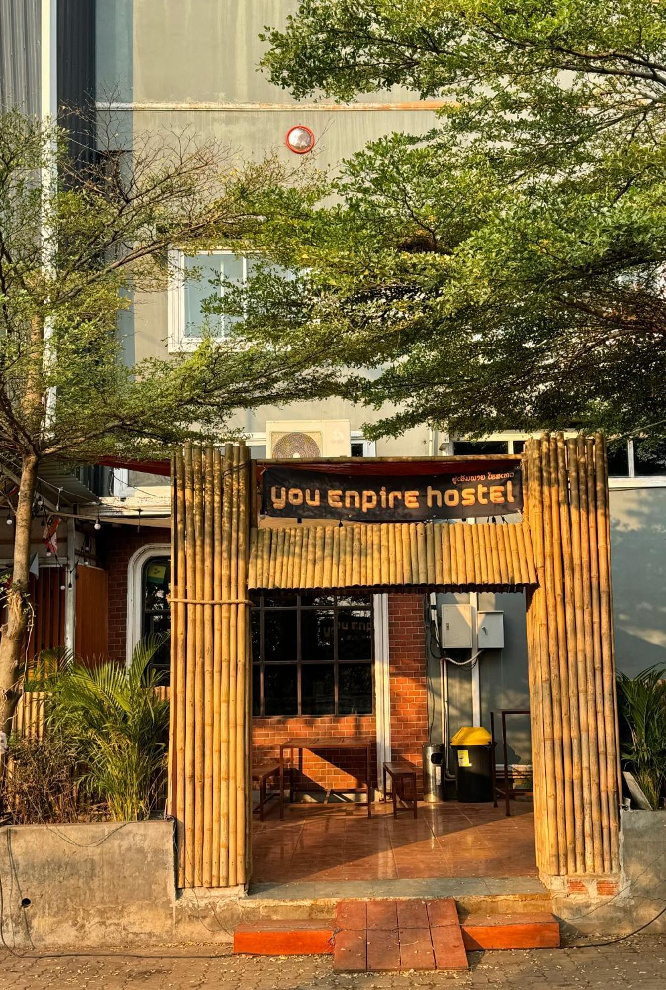 You Empire Hostel & Bar Pakse Bagian luar foto