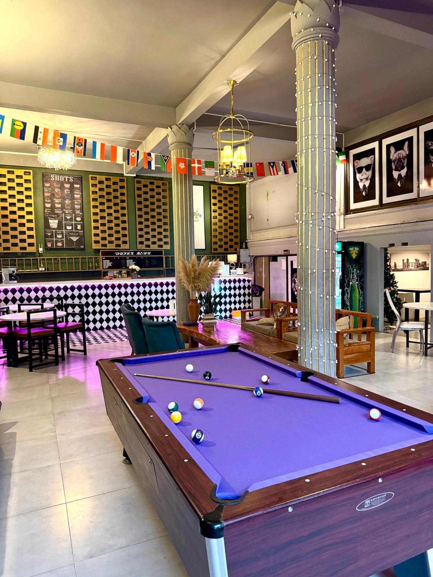 You Empire Hostel & Bar Pakse Bagian luar foto